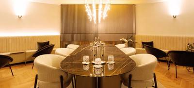 Foto von SATELLITE Office Villa Sander Kaminlounge „Stradivari“