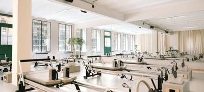 Foto von Reformer Pilates Teambuilding